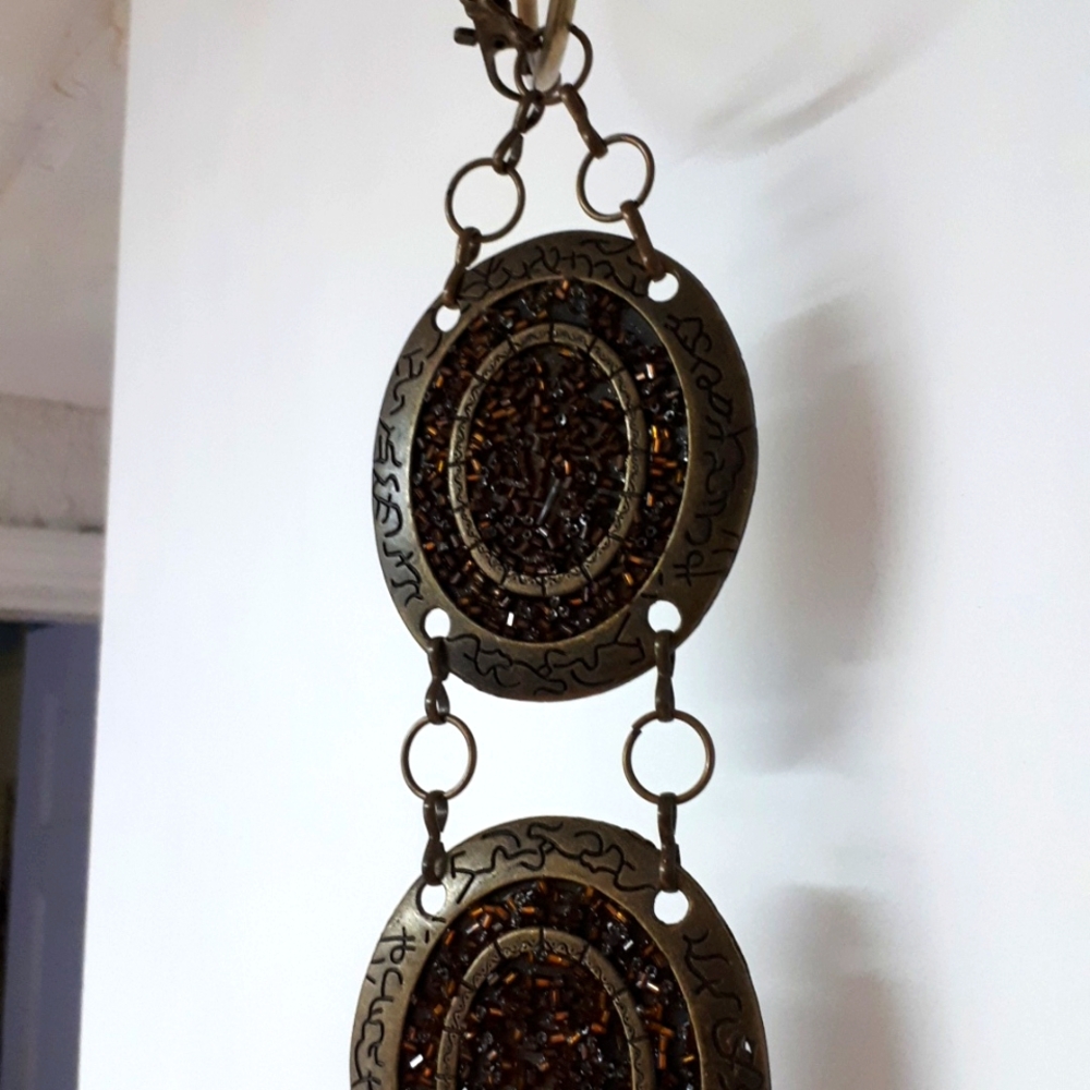 Metal Belt with bead ornamentation.